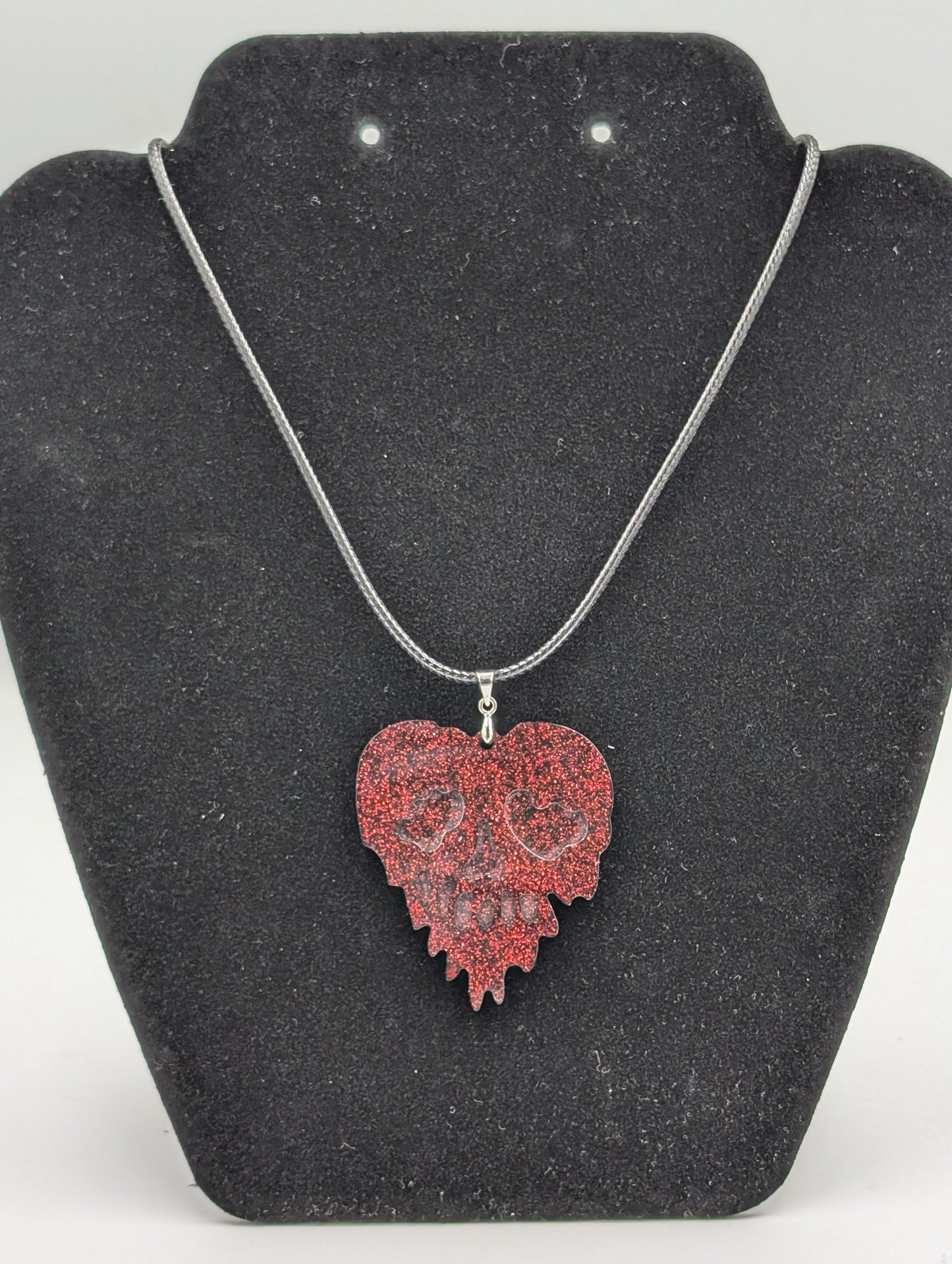 MELTED SKULL HEART NECKLACE