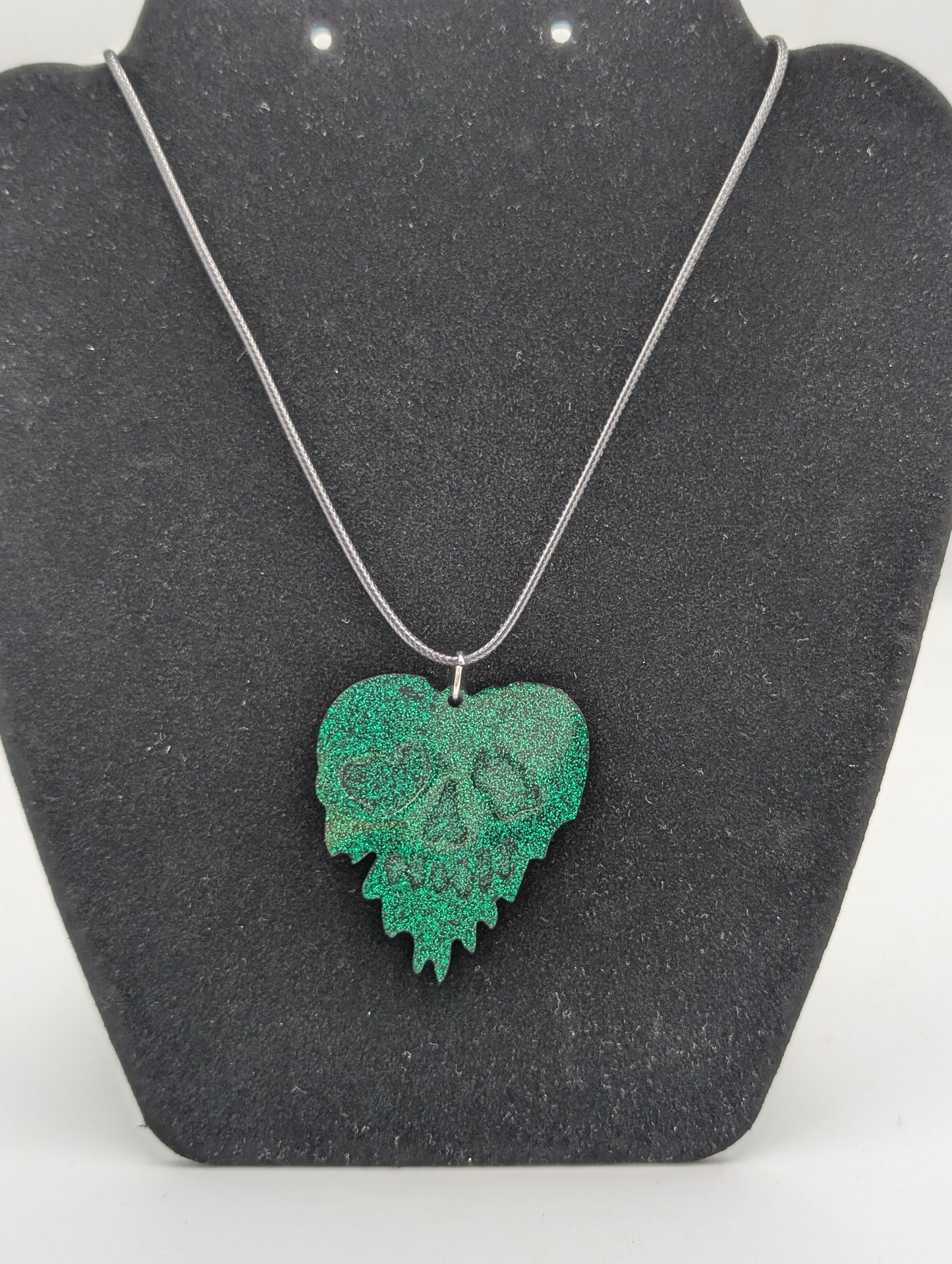 MELTED SKULL HEART NECKLACE