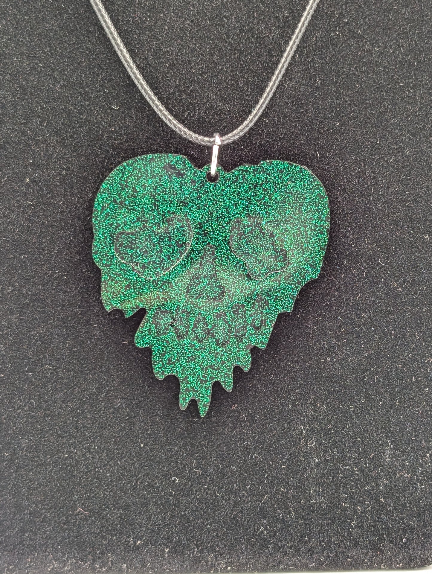 MELTED SKULL HEART NECKLACE